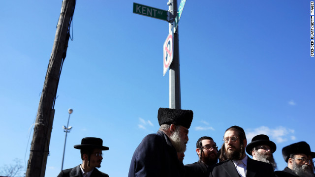 Members of the Brooklyn Orthodox Jewish community attend a news conference on Monday, March 4. 