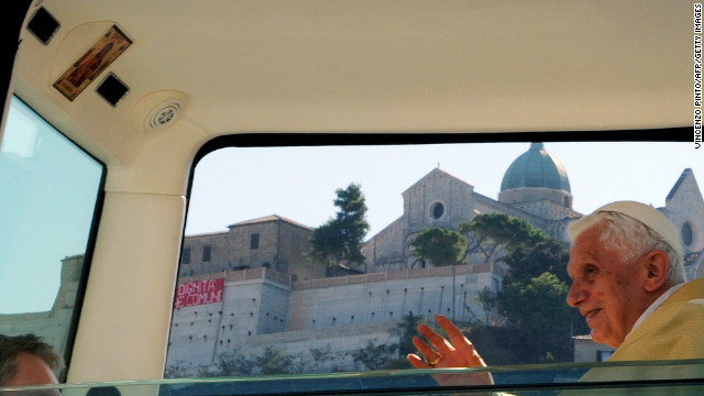 This Popemobile (photographed in September 2011) is fitted with a religious image just above the pope's seat.