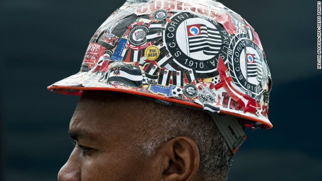 A construction worker at the site of the Itaquerao football stadium which will host the opening football matches of the FIFA World Cup 2014 in Sao Paulo, Brazil.