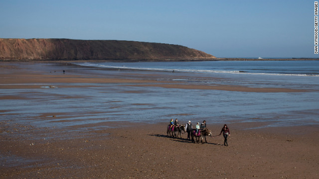 Tourists enjoy donkey rides on Filey Beach on March 2 in Filey, England.