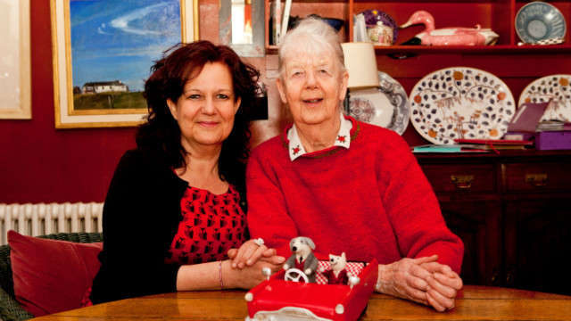 Like mother, like daughter. Shirley Hughes and her daughter Clara Vulliamy together after working on their first collaboration, "Dixie O'Day". A model of Dixie and his sidekick Percy is in front of them on the table.