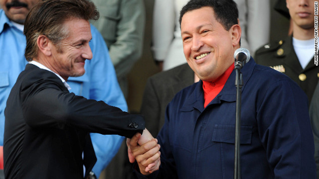 Venezuelan President Hugo Chavez greets actor Sean Penn after a meeting at the Miraflores presidential palace in Caracas on March 5, 2011. Penn thanked Chavez for the support given by the Venezuelan government to his nongovernmental organization, which benefits victims of the 2010 Haiti earthquake.