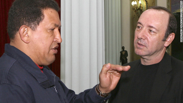 Chavez speaks to actor Kevin Spacey during a meeting at the Miraflores presidential palace on September 24, 2007.