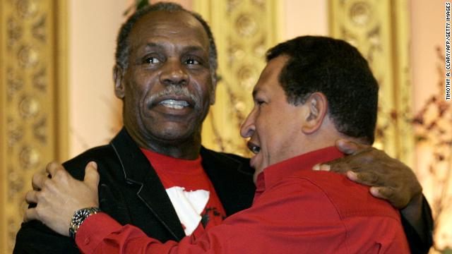 Actor Danny Glover and Chavez embrace while attending the The CITGO-Venezuela Heating Oil Program inauguration ceremony in Harlem, New York, on September 21, 2006. Chavez addressed the United Nations General Assembly a day earlier.