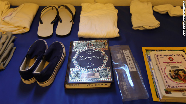 A Quran sits among a display of items isssued to detainees in September 2010. The suspects are given a prayer mat and a copy of the Muslim holy book as well as a toothbrush, soap, shampoo and clothing.