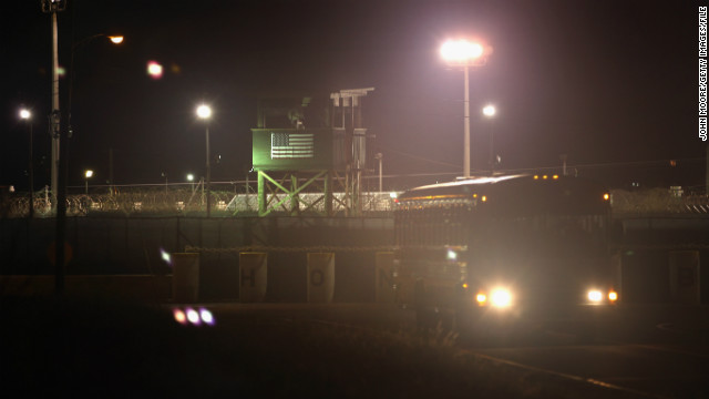 A bus carries military guards from their night shift at the detention center in September 2010.