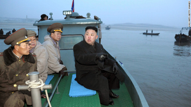 Kim arrives at Jangjae Islet by boat to meet with soldiers of the Jangjae Islet Defense Detachment near Taeyonphyong Island in South Hwanghae province on March 7.