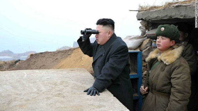 Kim uses a pair of binoculars to look south from the Jangjae Islet Defense Detachment near South Korea's Taeyonphyong Island on March 7.