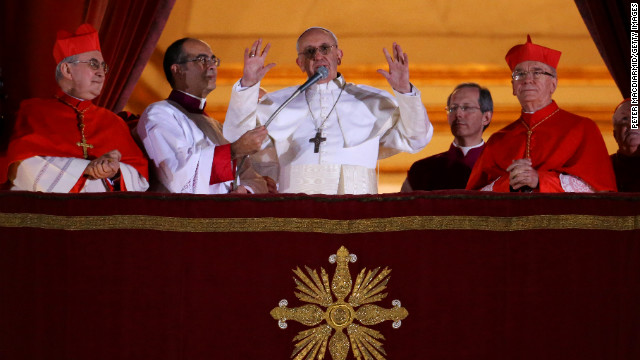 Newly elected Pope Francis speaks to the crowd from the central balcony of St. Peter's Basilica at the Vatican on Wednesday, March 13. Argentinian Cardinal Jorge Mario Bergoglio was elected as the first pontiff from Latin America and will lead the world's 1.2 billion Catholics.