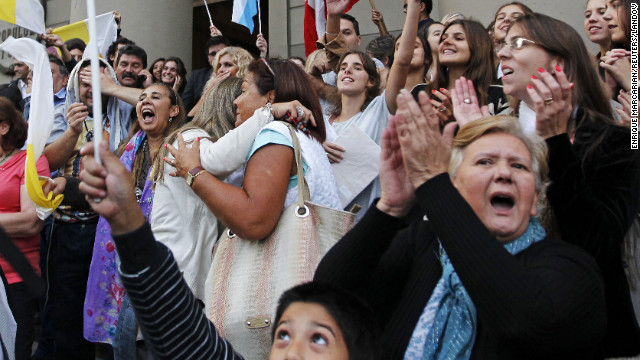 People celebrate the election of Argentinian Cardinal Jorge Bergoglio as Pope Francis at the Metropolitan Cathedral in Buenos Aires on Wednesday, March 13.