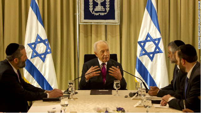 President Shimon Peres (C) sits with Shas Party leaders at the President's residence on January 31, 2013, Jerusalem.