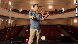 Anantawan on the stage of the Camden Opera House in Camden, Maine, where he spoke at the PopTech conference.