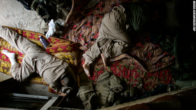 U.S. Marines sleep at their patrol base in the area known as Zaidon in Al Anbar province on May 12, 2007.