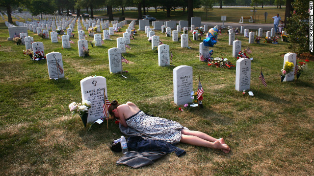 Mary McHugh mourns her fiance, Sgt. James Regan, at Arlington National Cemetery in Washington on May 27, 2007. The American Special Forces soldier was killed by an IED in Iraq in February.