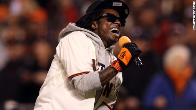 Lil Wayne sings "Take Me Out to the Ball Game" during the seventh-inning stretch as the San Francisco Giants took on the St. Louis Cardinals during the National League Championship Series in 2012.