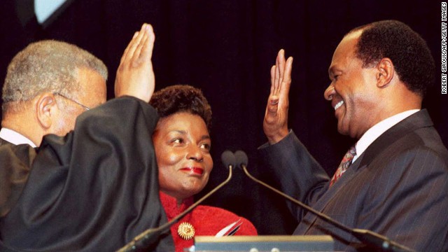 Marion Barry is sworn in as the mayor of Washington with his wife, Cora Masters Barry, at his side, in 1995. Four years earlier, he was forced from the mayor's office, and later imprisoned, for being caught on videotape smoking crack.