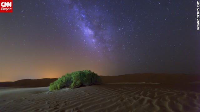 The <a href='http://ireport.cnn.com/docs/DOC-814073'>Milky Way galaxy</a> shines in the sky above the desert outside Abu Dhabi.