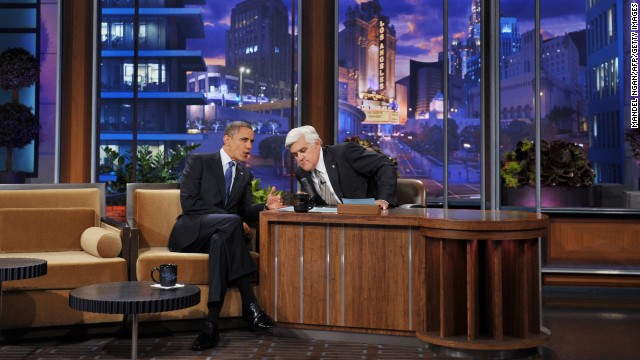 Leno returned in March 2010 and is currently the host. Pictured, Leno chats with President Barack Obama during a taping, October 2012.