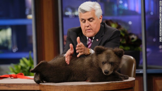 Leno with a Kodiak bear cub on May 16.