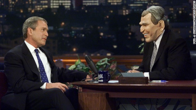 Texas Gov. George W. Bush and Leno in a Bush mask on October 30, 2000.