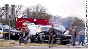 Photos of a firey crash scene in Texas after a high speed chase that may be related to the shooting death of Tom Clements, Colorado\'s prison chief.