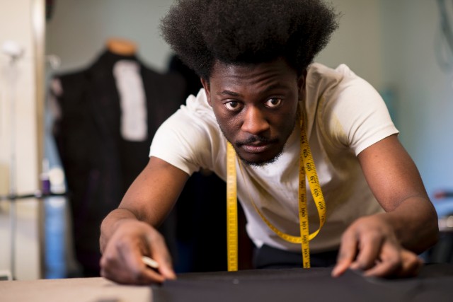Aspiring designer Afriyie Poku learned everything he knows by altering his clothes to his liking.