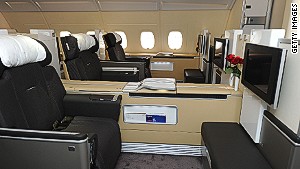 Lufthansa\'s first class: retractable walls between seats can separate passengers. 