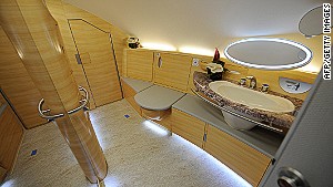 Nope, that\'s not your hotel. It\'s the bathroom available to first-class passengers on Emirates Airlines A380 flights.