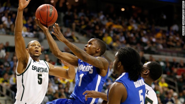 Joe Jackson of Memphis drives for a shot against Adreian Payne of Michigan State on March 23.