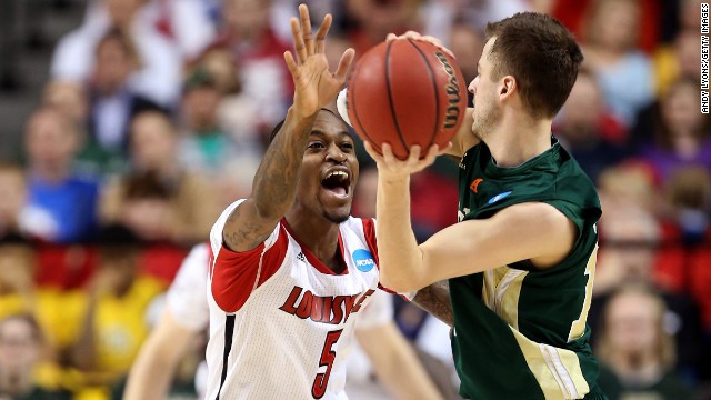 Kevin Ware of Louisville defends against Wes Eikmeier of Colorado State on March 23.