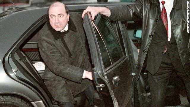 Boris Berezovsky began his working life as a math professor, and then a systems analyst, before switching to more lucrative jobs, according to CNN's Jill Dougherty. He is pictured here at Moscow airport in 1999.