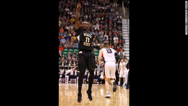 Cleanthony Early of Wichita State, left, celebrates after making a three-pointer against Gonzaga on March 23.