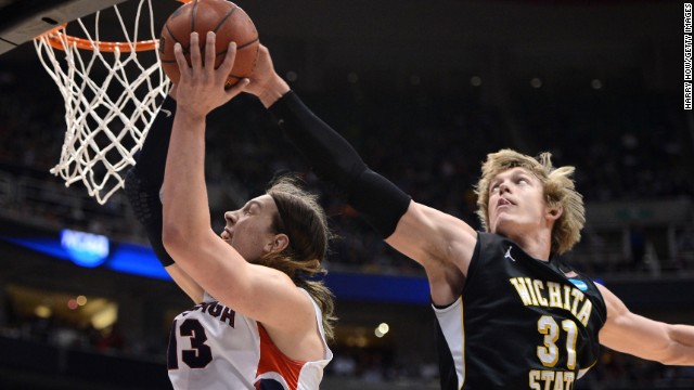 Kelly Olynyk of Gonzaga, left, has his shot blocked by Ron Baker, right, of Wichita State on March 23.