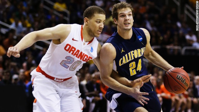 Ricky Kreklow of California, right, drives against Brandon Triche, left, of Syracuse on March 23.