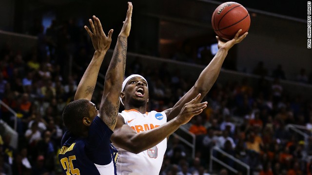 C.J. Fair of Syracuse, right, goes up against Richard Solomon, left, of California on March 23.