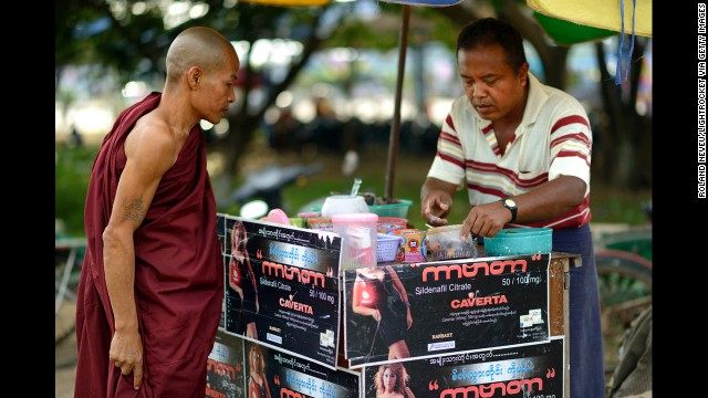 A Buddhist monk checks out a stand in Pyinmana.