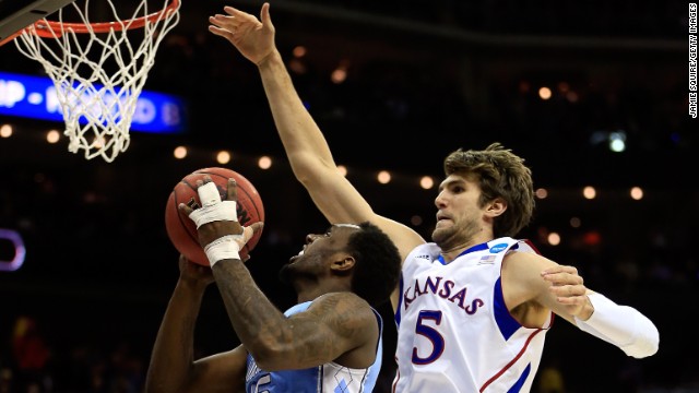 P.J. Hairston of the North Carolina Tar Heels drives for a shot attempt against Jeff Withey of the Kansas Jayhawks on March 24 in Kansas City, Missouri. Kansas defeated UNC 70-58.