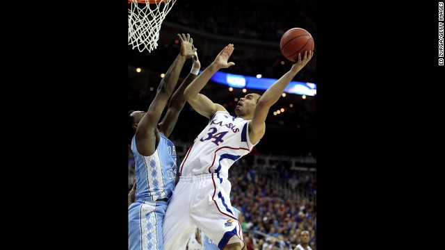 Perry Ellis of Kansas attempts a shot on March 24.