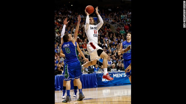 James Rahon of San Diego State shoots over Florida Gulf Coast players on March 24.