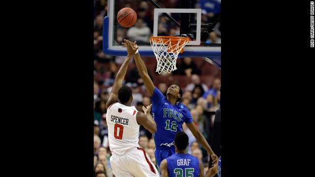 Skylar Spencer of San Diego State shoots over Eric McKnight of Florida Gulf Coast on March 24.