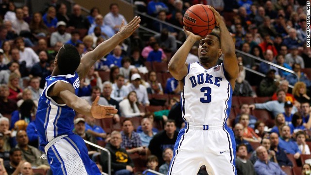 Tyler Thornton of the Duke Blue Devils shoots a three-pointer at the halftime buzzer against the Creighton Bluejays on March 24 in Philadelphia. Duke won 66-50. Check out the action from the third round of the 2013 NCAA tournament and look back at the NCAA tournament Round of 64.