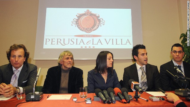 Meredith Kercher's family lawyer Francesco Maresca, left, argued in court in 2011 that the multiple stab wounds implied that there was more than one aggressor who killed Kercher. Pictured from left are Maresca, Kercher's father John, sister Stephanie, brother Lyle and brother John at a press conference in 2008.