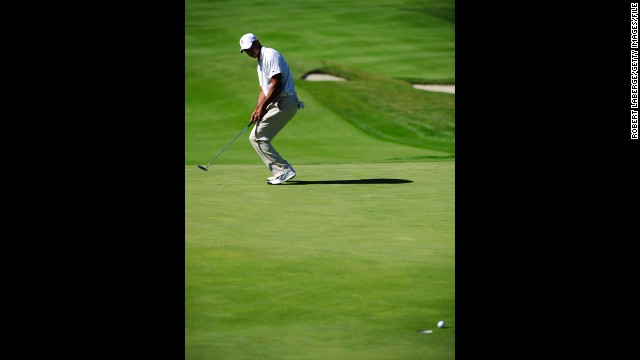 Woods misses a putt at the Frys.com Open in October 2011. That month, he dropped out of golf's Top 50 players list for the first time in almost 15 years. Woods reportedly lost millions in endorsements after sponsors ended their ties with him in the wake of a sex scandal.