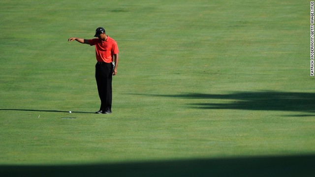 Woods drops the ball on the 15th fairway during the final round of the AT&T National in July 2012. He overtook Jack Nicklaus for second place on the all-time PGA Tour list with his victory at the AT&T National.