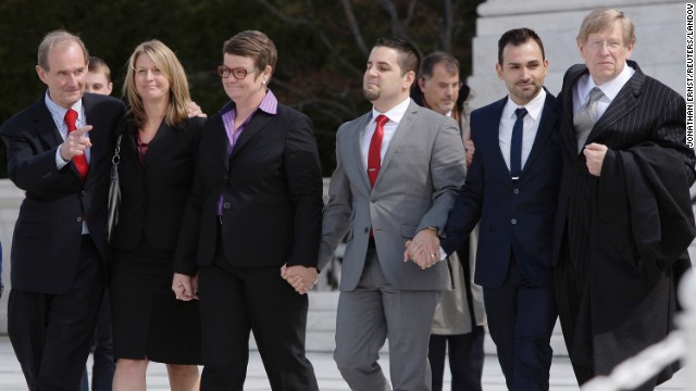 From left, attorney David Boies, plaintiffs Sandra Stier, Kris Perry, Jeff Zarrillo and Paul Katami, and attorney Theodore B. Olson exit together from the Supreme Court after their case against California's Proposition 8 was argued on Tuesday, March 26. 