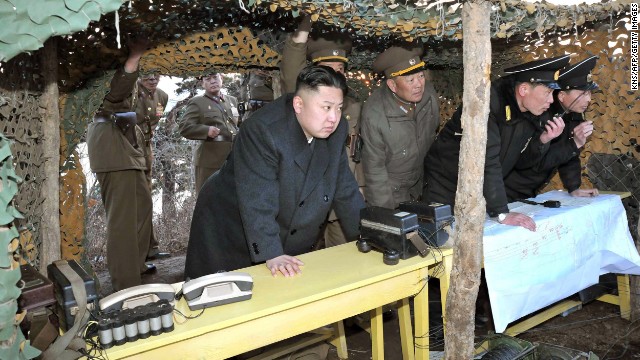 North Korean leader Kim Jong Un inspects drills by the Korean People's Army (KPA) Navy at an undisclosed location on North Korea's east coast in a photo from the state-run Korean Central News Agency taken on March 25, 2013.