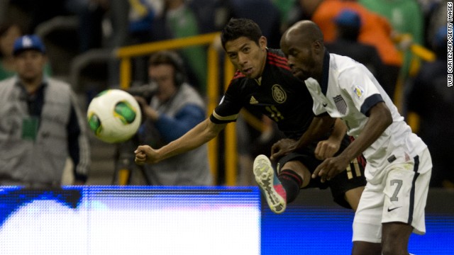 Mexico's Javier Aquino and U.S. defender DaMarcus Beasley go to head to head for ball during their 2014 World Cup qualifying football match at Azteca Stadium in Mexico City on Tuesday, March 26. The regional rivals tied 0-0.