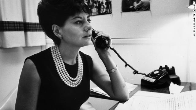 Walters takes a phone call at her desk in New York in 1962.