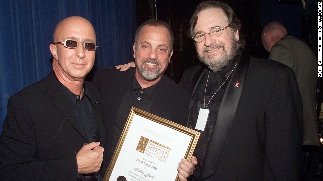 Music producer and innovator <a href='http://www.cnn.com/2013/03/30/showbiz/obit-phil-ramone/index.html'>Phil Ramone</a>, right, with Paul Shaffer, left, and Billy Joel at the Song Writers Hall of Fame Awards in New York in 2001. Ramone died March 30 at the age of 72.