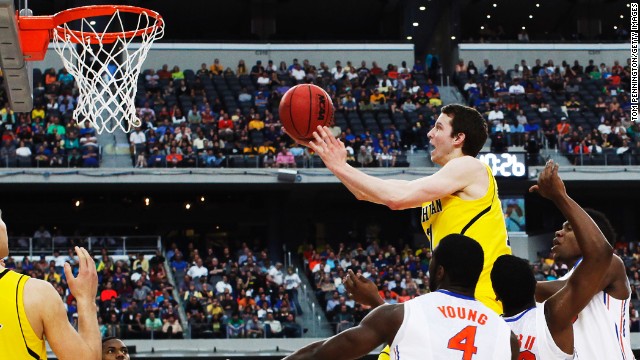 Nik Stauskas of Michigan shoots over Florida on March 31.